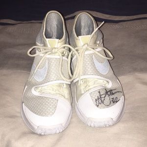 Nike autographed shoes.